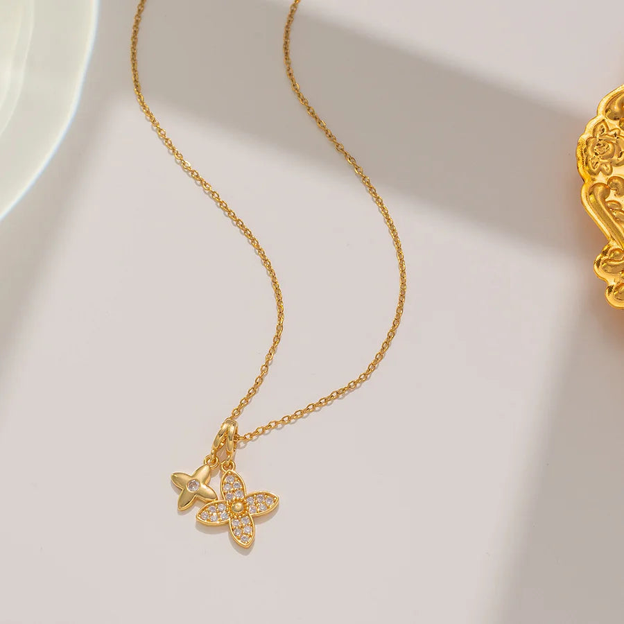 Collier double fleurs strass