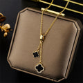 Collier double pendentif trèfles